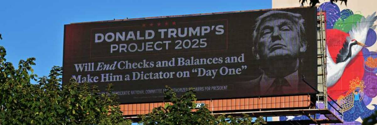 The Democratic National Committee Covers Philadelphia With Information On Trump Project 2025 With Billboards, Lite Brites, And A Plane Banner Flying Over Phillies Game