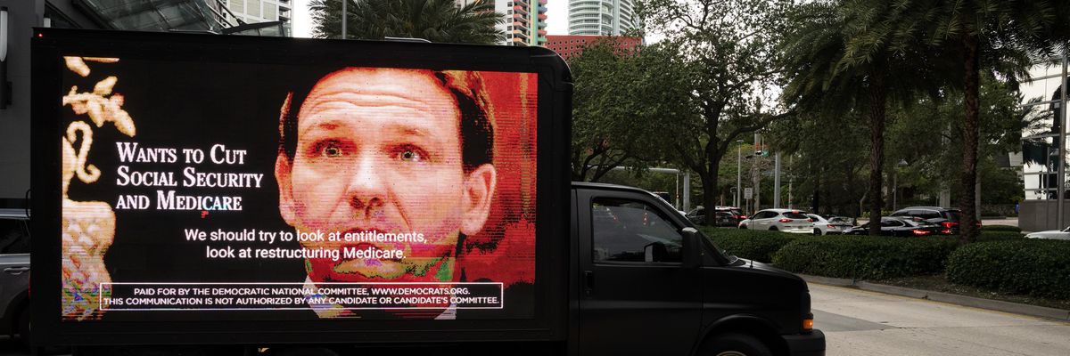 The Democratic National Committee's mobile billboard drives through the streets of Miami ahead of Republican Florida Gov. Ron DeSantis' presidential campaign launch on May 24, 2023. 