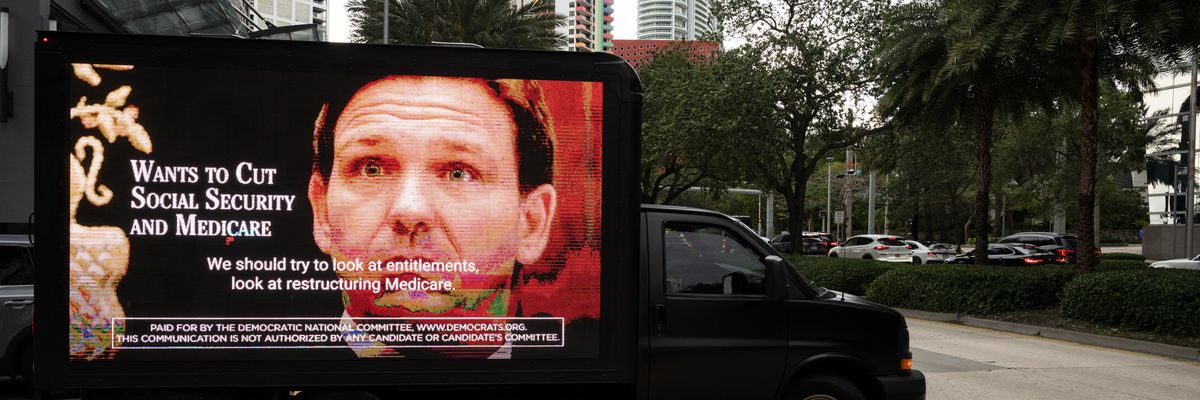  The Democratic National Committee's mobile billboard drives through the streets of Miami ahead of Republican Florida Gov. Ron DeSantis' presidential campaign launch on May 24, 2023. ​