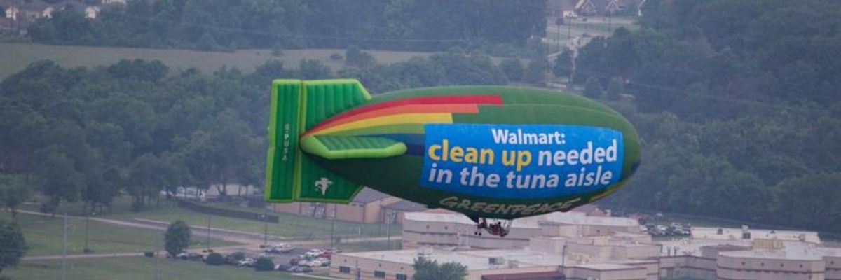 Call to 'Save Oceans, Protect Workers' Goes Airborne as Greenpeace Targets Walmart