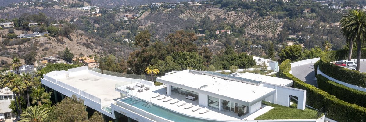 The guest house and space for a tennis court at "The One Bel Air"—a 105,000-square-foot mansion with a sky deck, putting green, night club, several swimming pools, a 50-seat theater, a four-lane bowling alley, and more—is shown in this aerial photo taken on September 8, 2021 in Beverly Hills, California.