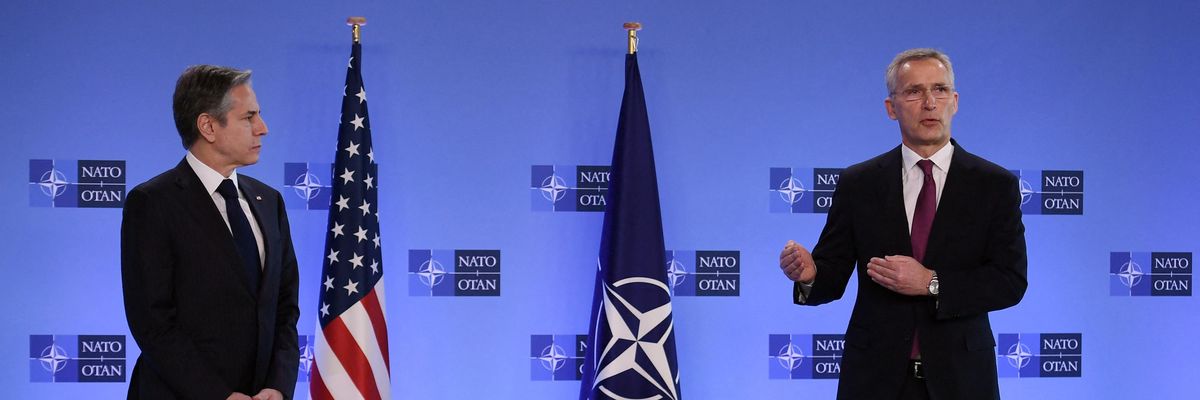 The head of NATO speaks at a press conference
