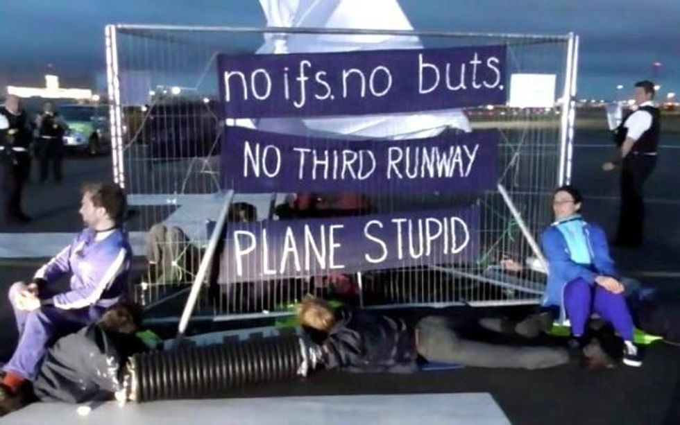 The Heathrow 13 were arrested after their July 13th occupation of a Heathrow runway to protest the airport's planned expansion. (Photo: Plane Stupid)
