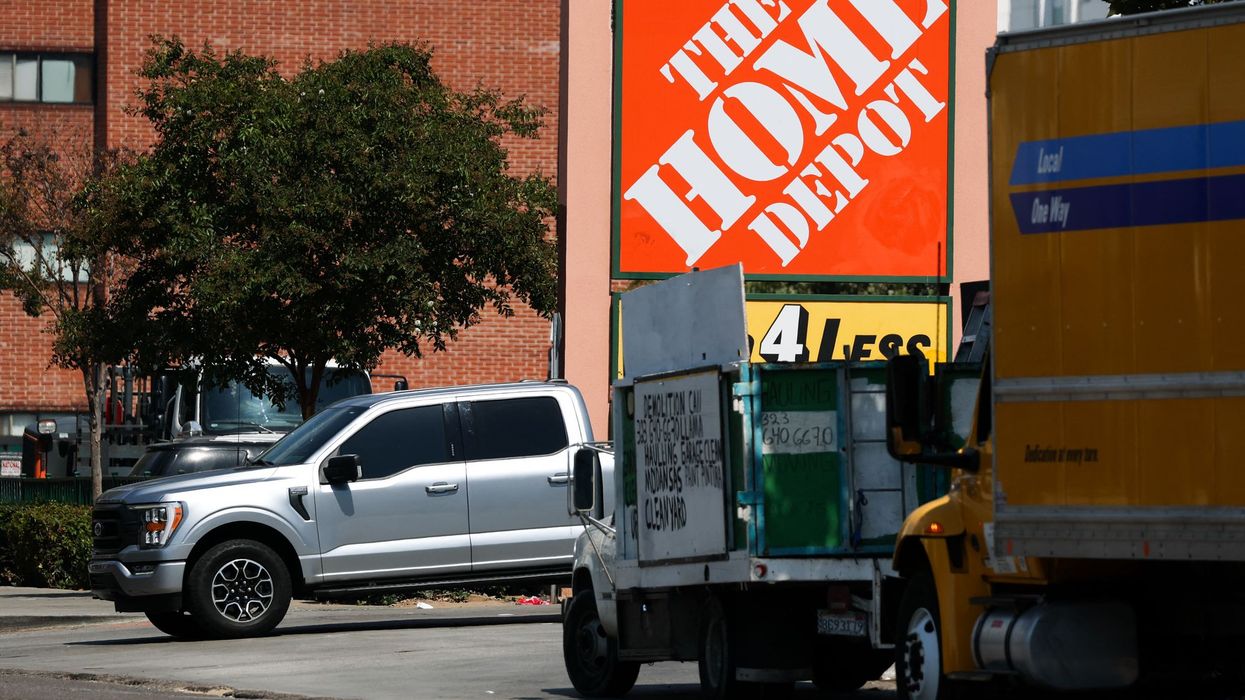 The Home Depot logo is displayed outside a store that was previously the site of US Customs and Border Protection arrests of day laborers