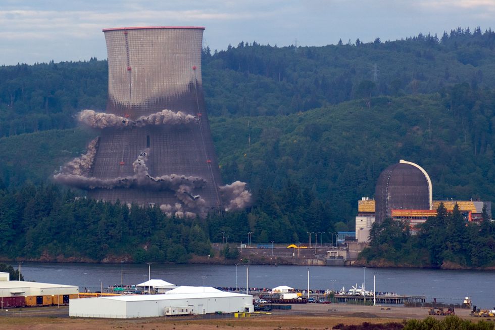The implosion of the cooling tower of the Trojan Nuclear Power Plant.