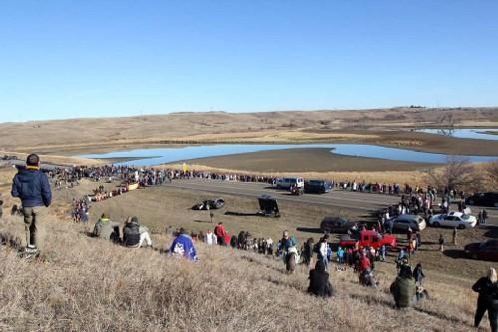 The interfaith witness formed a huge Niobrara Circle of Life just south of the backwater bridge where on the other side law enforcement officers kept watch. Opponents of the Dakota Access Pipeline have held the bridge since law enforcement on Oct. 24 cleared a newly set up protest camp on private land; land that some say belongs to the Sioux Nation.