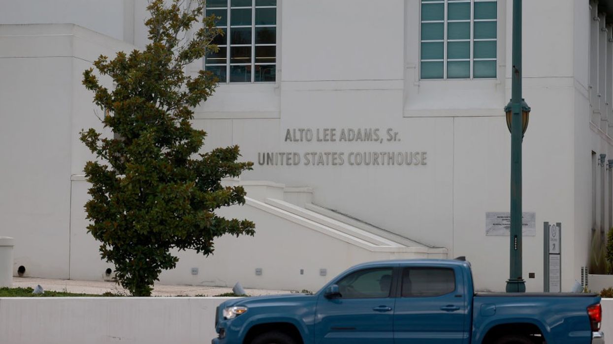 The label on the wall of the Alto Lee Adams Sr. United States Courthouse.