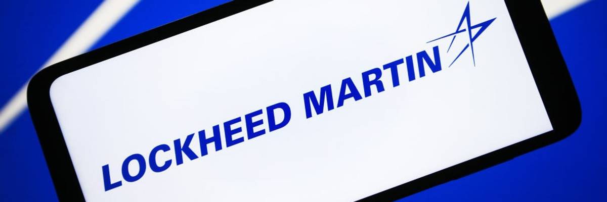 The Lockheed Martin logo in blue on a white smartphone screen.