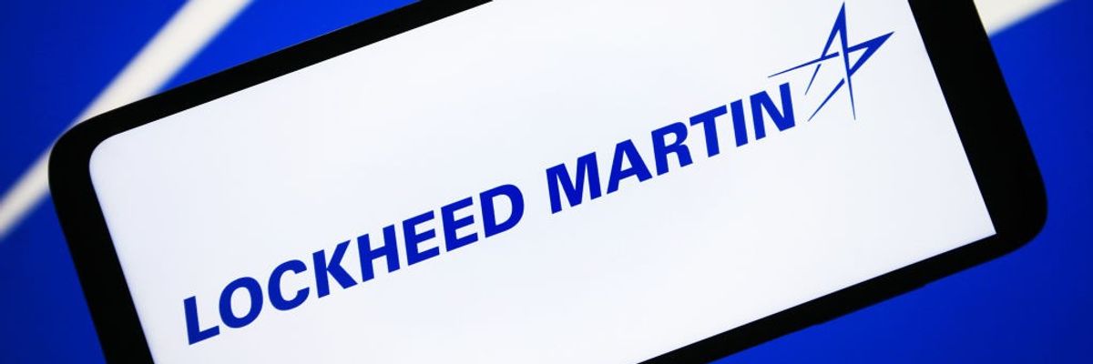 The Lockheed Martin logo in blue on a white smartphone screen.