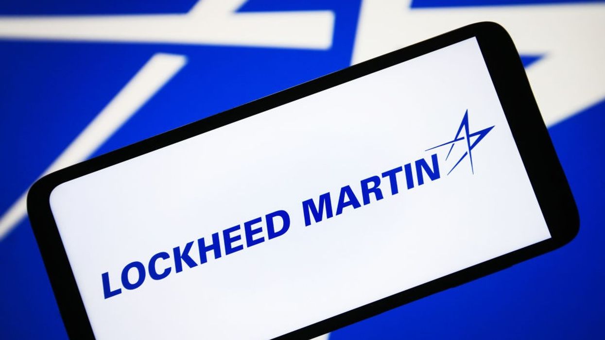 The Lockheed Martin logo in blue on a white smartphone screen.