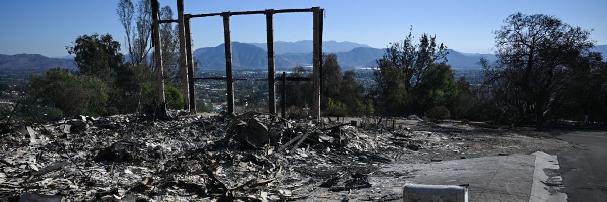 The mailbox and metal frame of a home destroyed by the Mountain Fire