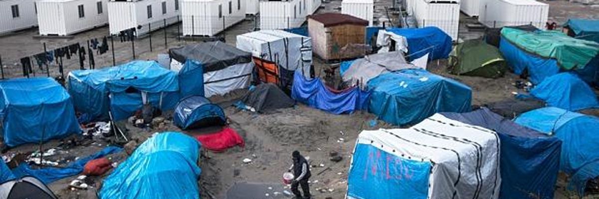 As French Government Threatens to Destroy Camp, Refugees Defiant