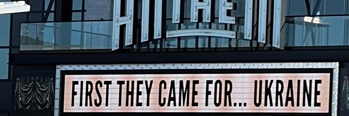 The marquee on the Anthem theatre reads "First They Came for... Ukraine"