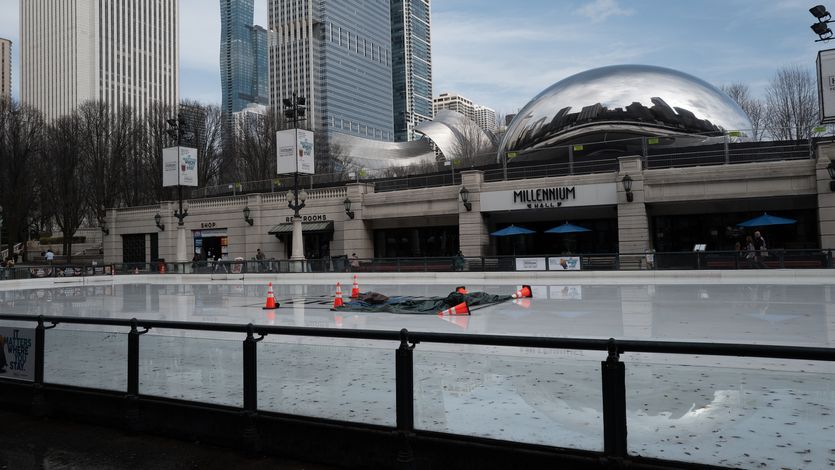 The Millennium Park ice rink in Chicago on a warm winter day.