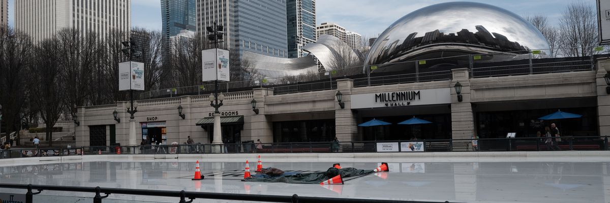 The Millennium Park ice rink in Chicago on a warm winter day.
