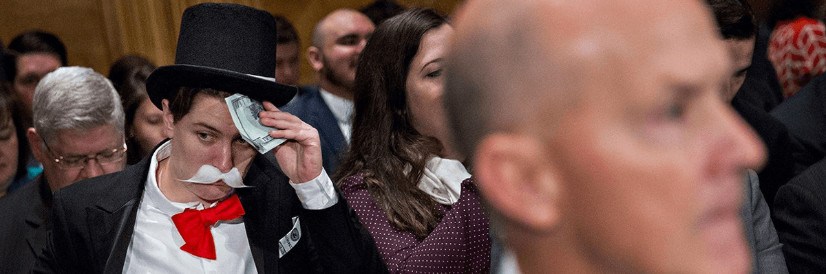 'Monopoly Man' Mocks Equifax CEO While Warren Demands Answers on Security Breach