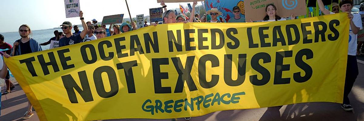 "The Ocean Needs Leaders—Not Excuses," says Greenpeace banner