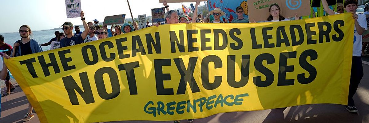"The Ocean Needs Leaders—Not Excuses," says Greenpeace banner
