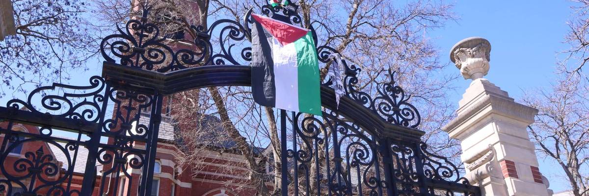 The Palestinian flag is hung from a gate at Smith College.