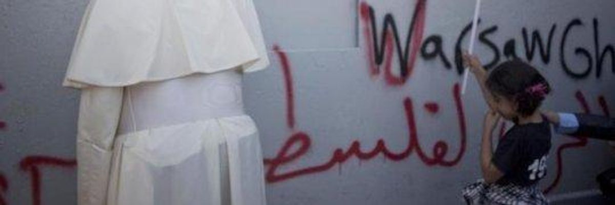 Defying Israel, Pope Prays at 'Apartheid Wall'