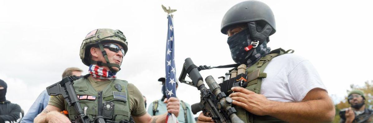 The Proud Boys, a right-wing pro-Trump group, are heavily armed with military weapons gather with their allies in a rally called End Domestic Terrorism 