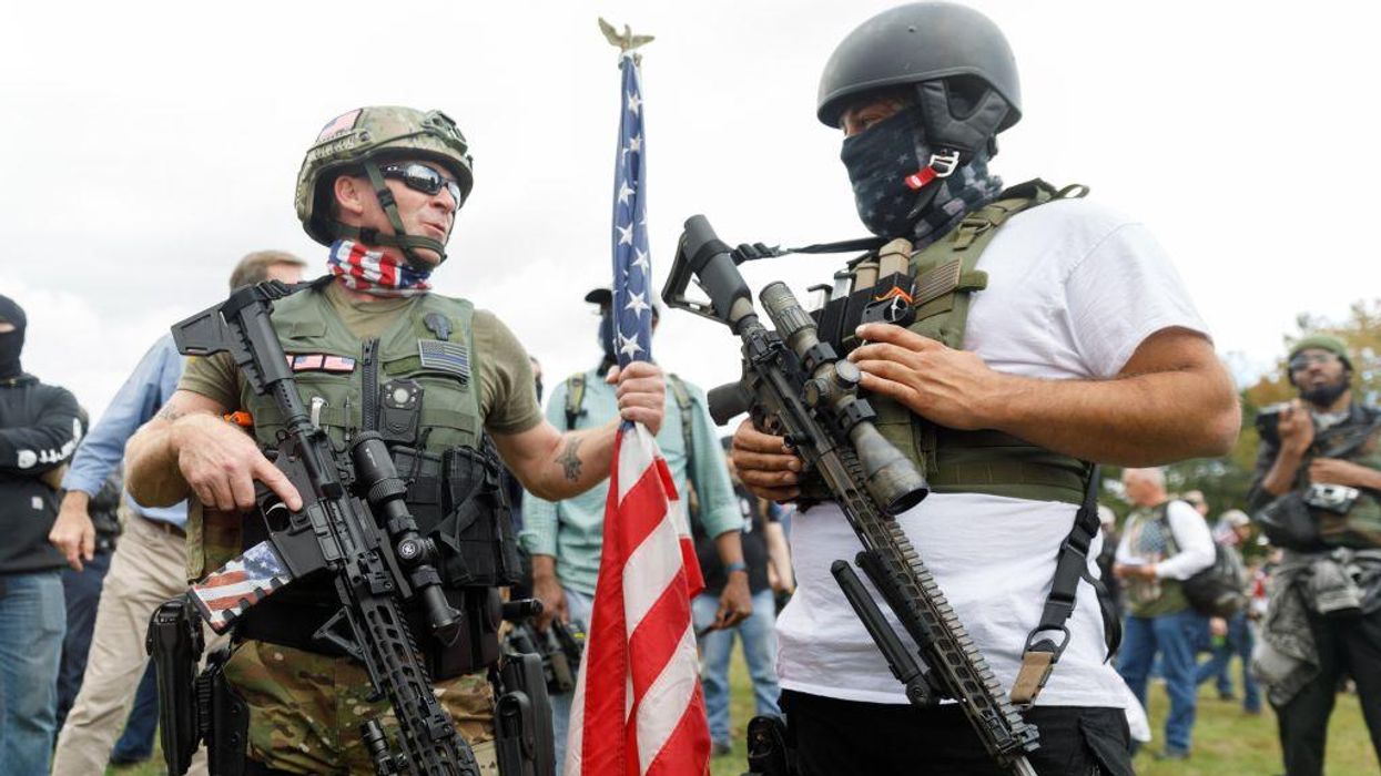 The Proud Boys, a right-wing pro-Trump group heavily armed with military-grade weapons, gather for a rally against anti-fascists in Portland, Oregon on September 26, 2020.
