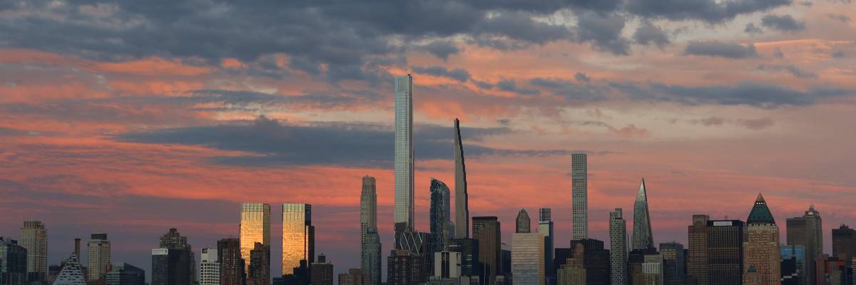 The sun sets on Central Park Tower and other buildings along Billionaires' Row in New York City on September 25, 2022.