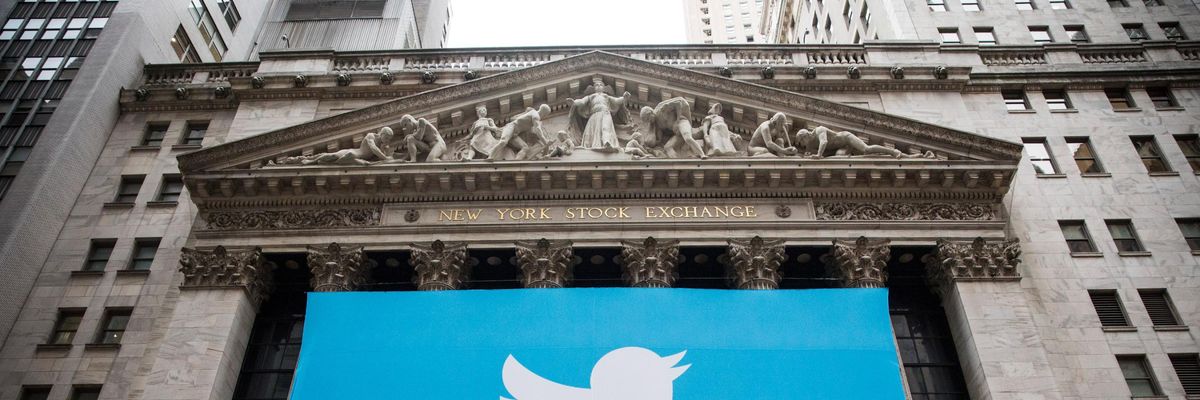 The Twitter logo is displayed on a banner outside the New York Stock Exchange on November 7, 2013 in New York City. (Photo: Andrew Burton via Getty Images)