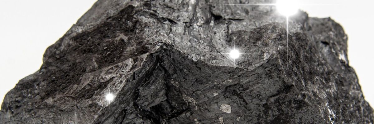 The U.S. Department of Energy shared an image of coal with the message, "She is the moment,"