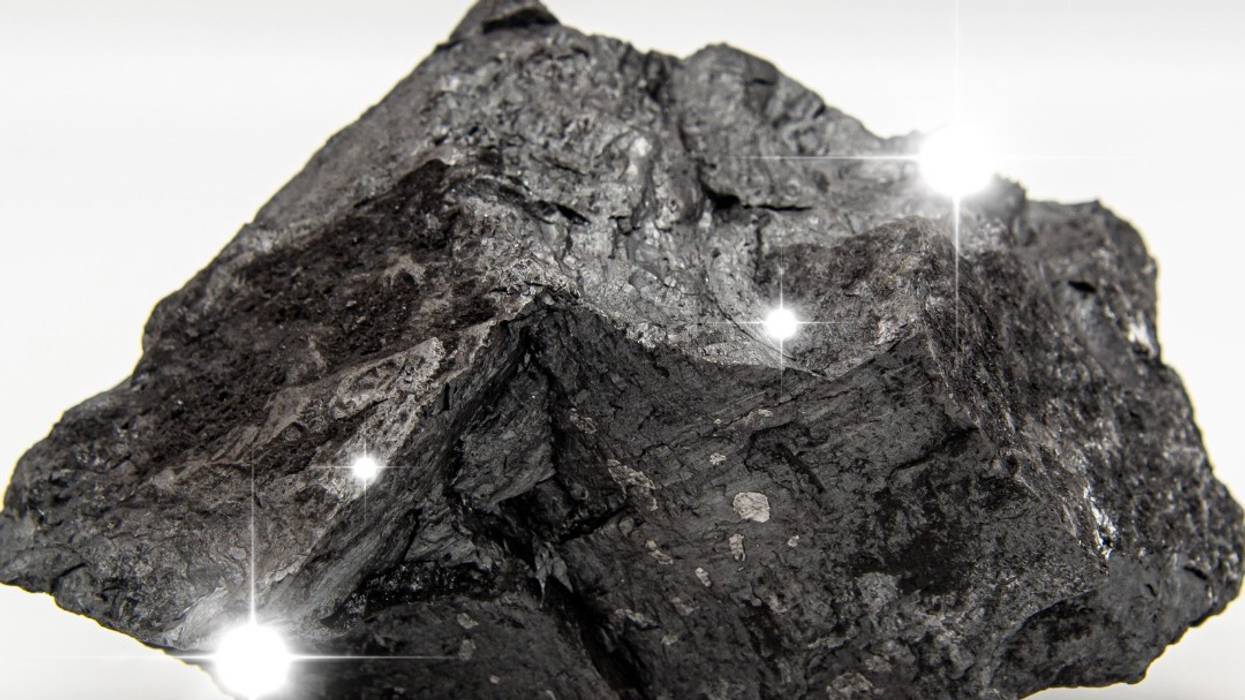 The U.S. Department of Energy shared an image of coal with the message, "She is the moment,"
