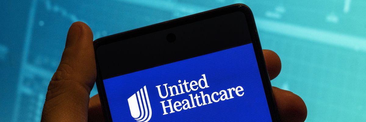 The UnitedHealth logo is seen displayed on a smartphone