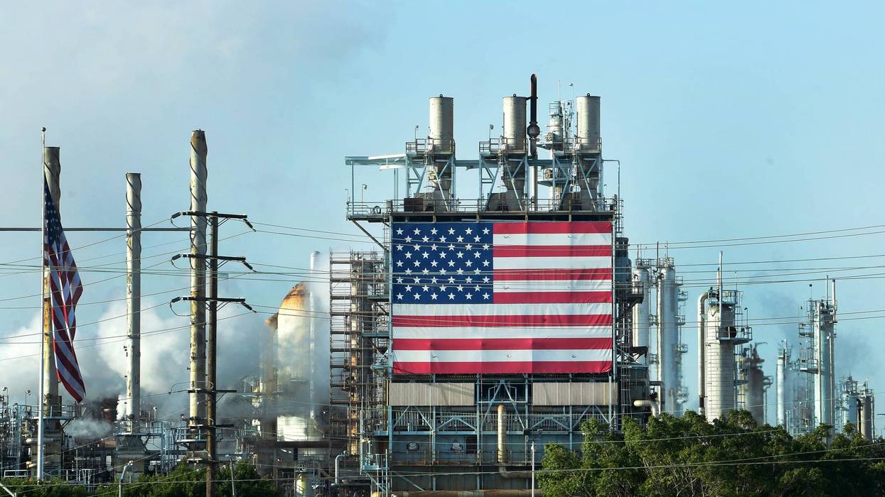 The US flag is displayed at the Wilmington Oil Fields south of Los Angeles, California on April 21, 2020.