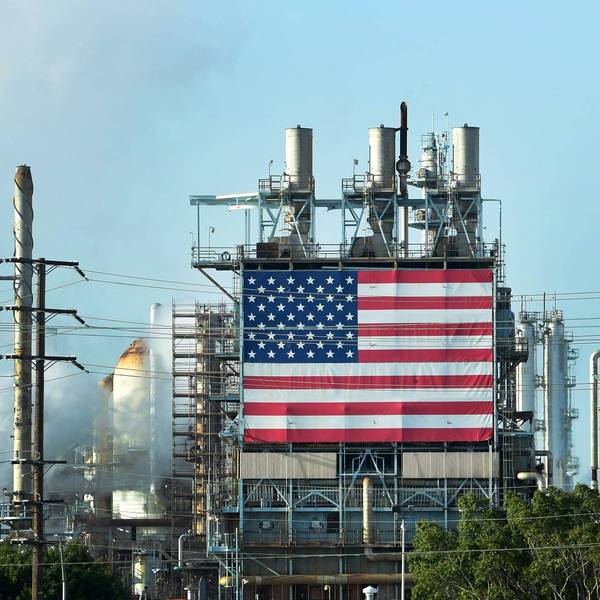 The US flag is displayed at the Wilmington Oil Fields south of Los Angeles, California on April 21, 2020.