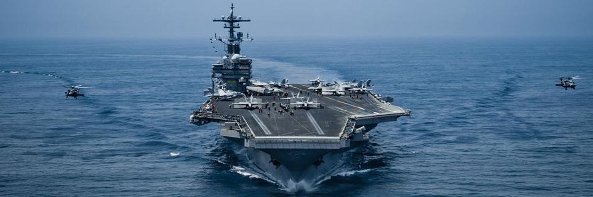 The USS George H W Bush leading a U.S. Navy aircraft carrier battle group.