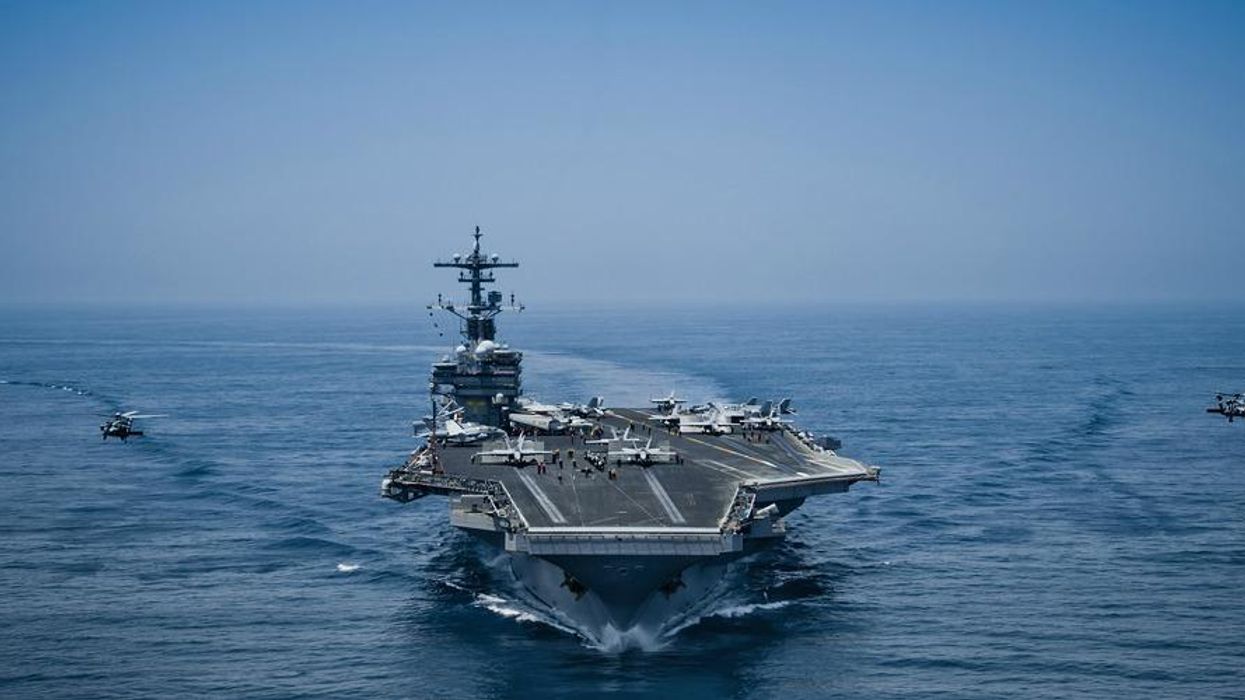 The USS George H W Bush leading a U.S. Navy aircraft carrier battle group.