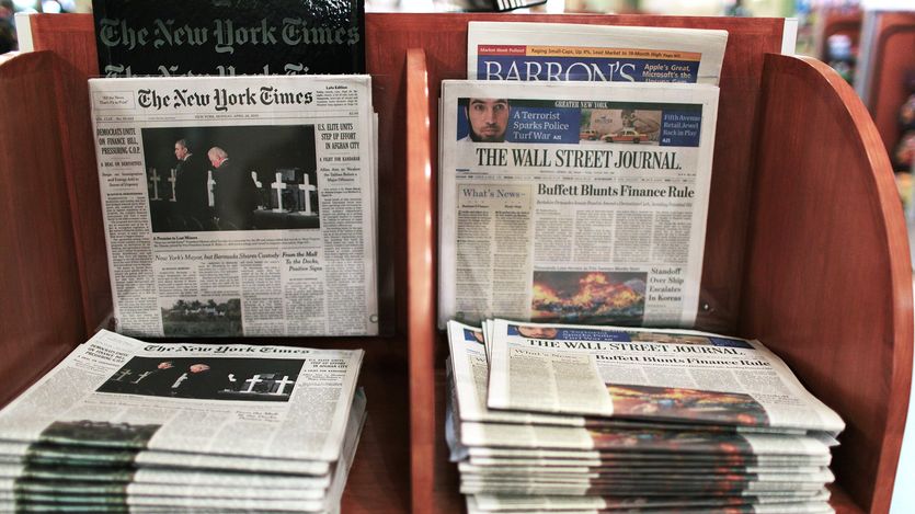 The Wall Street Journal is viewed beside The New York Times in New York City.