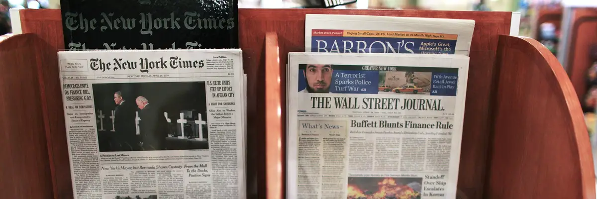 The Wall Street Journal is viewed beside The New York Times in New York City.