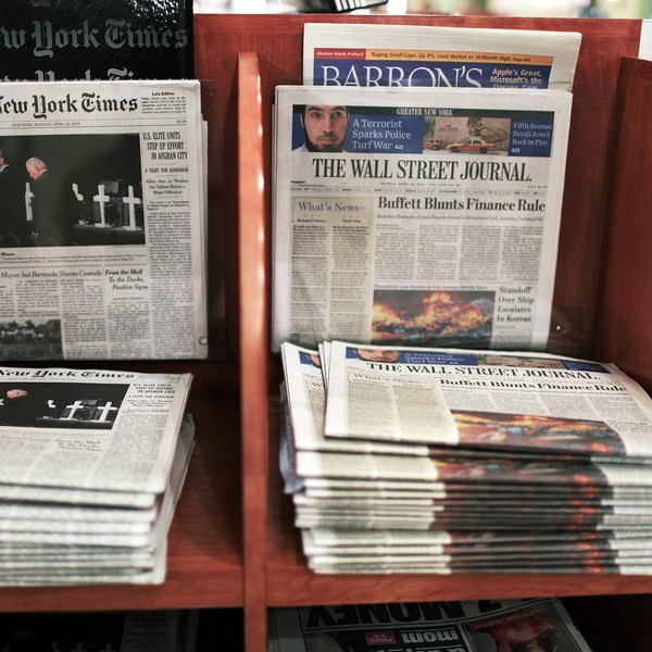 The Wall Street Journal is viewed beside The New York Times in New York City.
