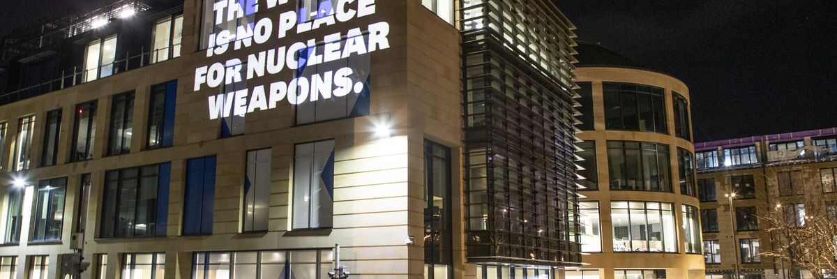 "The World Is No Place for Nuclear Weapons" was projected onto the side of Queen Elizabeth House