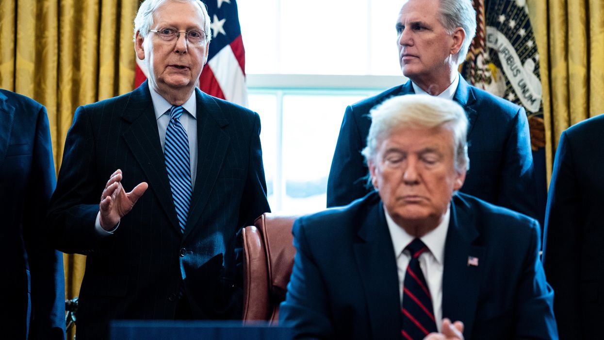 Then-Senate Majority Leader Mitch McConnell (R-Ky.) speaks as then-House Minority Leader Kevin McCarthy (R-Calif.) and then-President Donald Trump listen on March 27, 2020 in Washington, D.C.