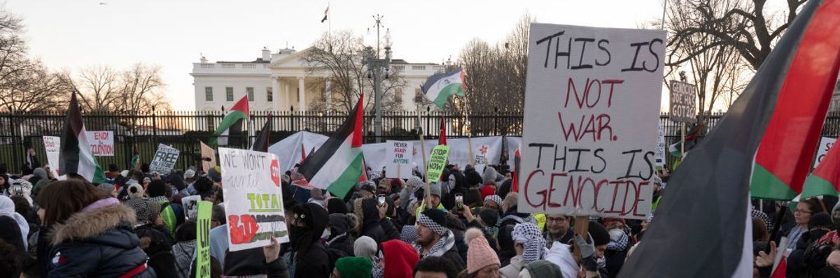 "This is not war. This is genocide," sign outside Biden White House