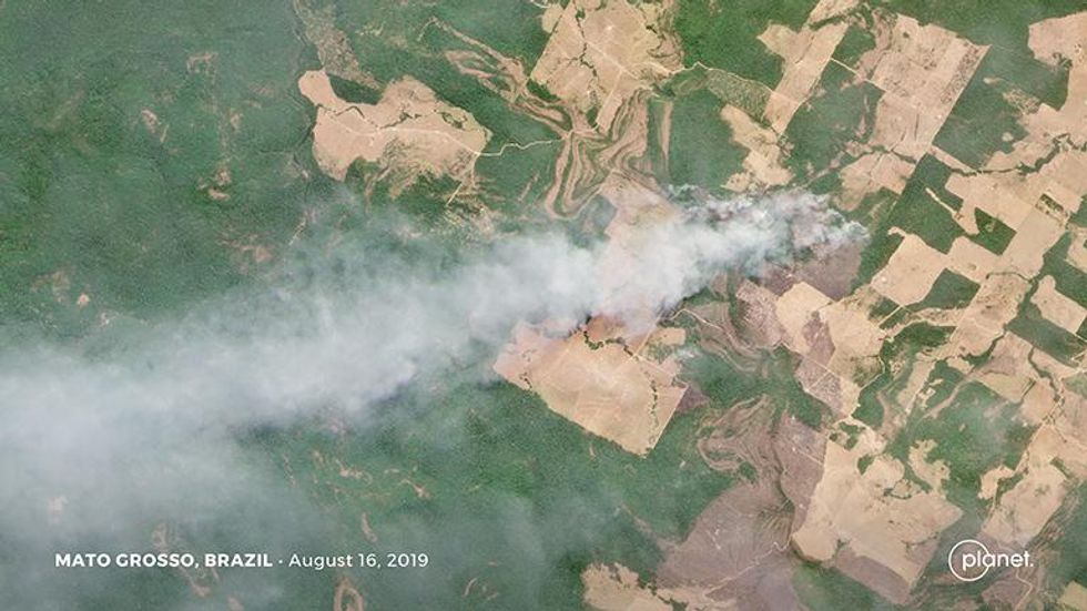 This Planet image shows a fire burning in an area of recent forest clearing in Mato Grosso, Brazil. The utility of Planet's data has spurred speculation that its constellation could be used by the Brazilian government to replace INPE's deforestation monitoring system. But Planet has denied negotiating with the Brazilian government on such a plan. Courtesy of Planet Labs Inc.