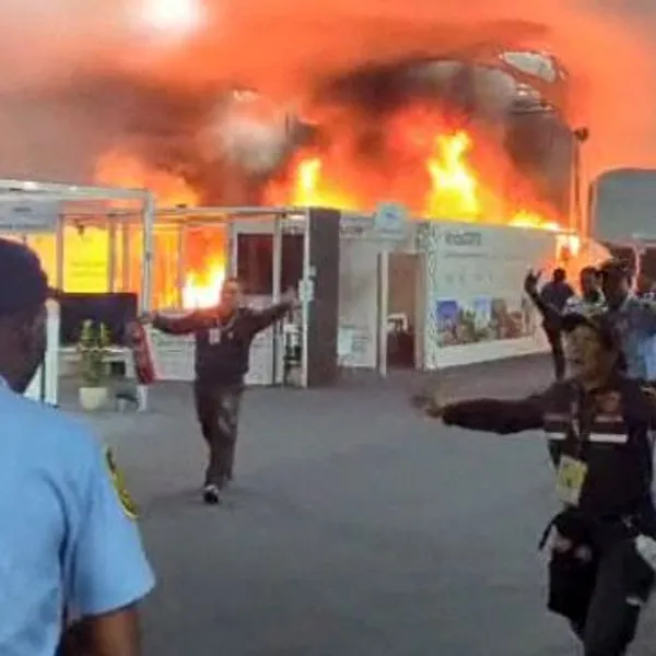 'Potent Metaphor': Fire Forces Evacuation of UN Climate Conference