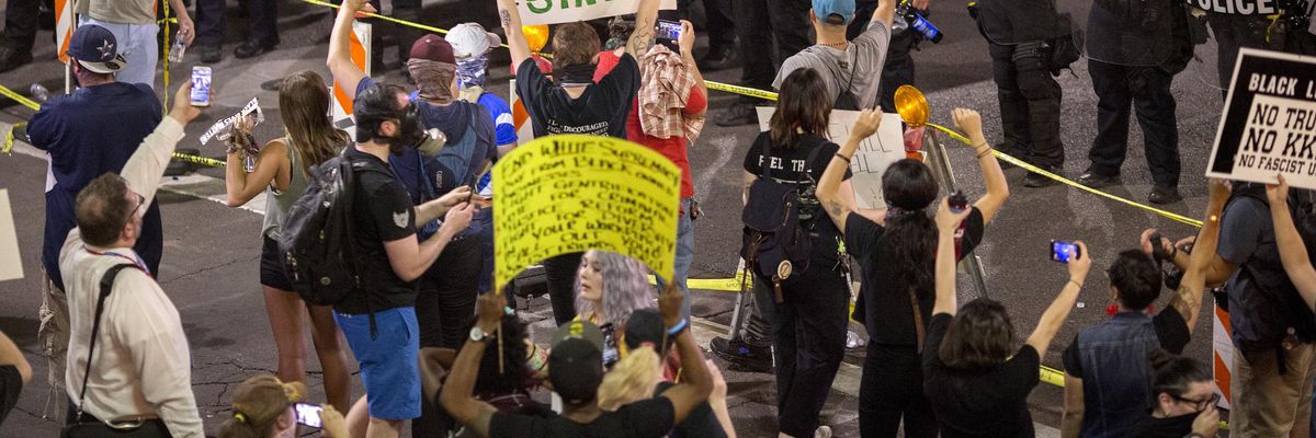 Police Tear-Gas Demonstrators at Huge Anti-Trump Protest in Phoenix