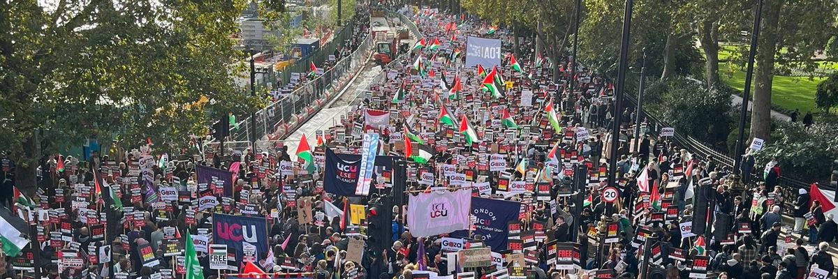 Thousands march in London for Palestine.