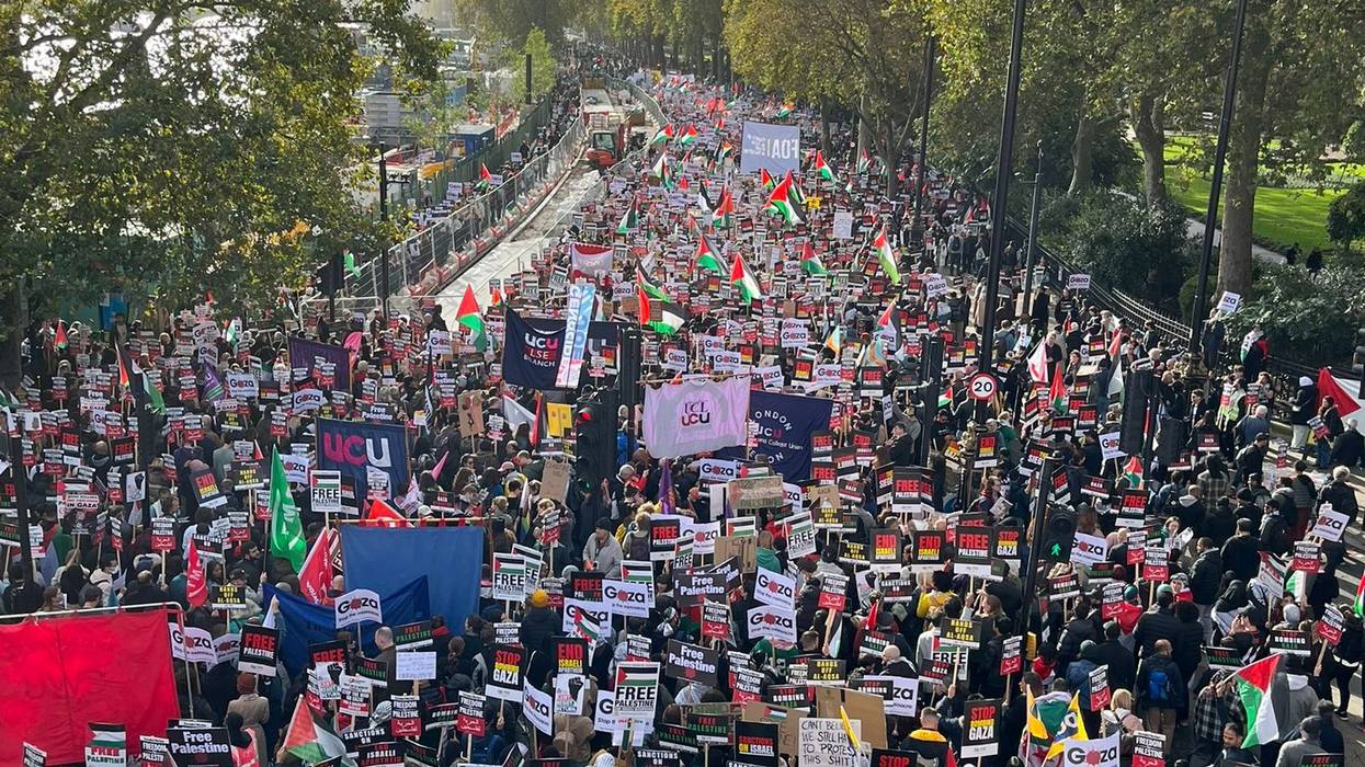 Thousands march in London for Palestine.