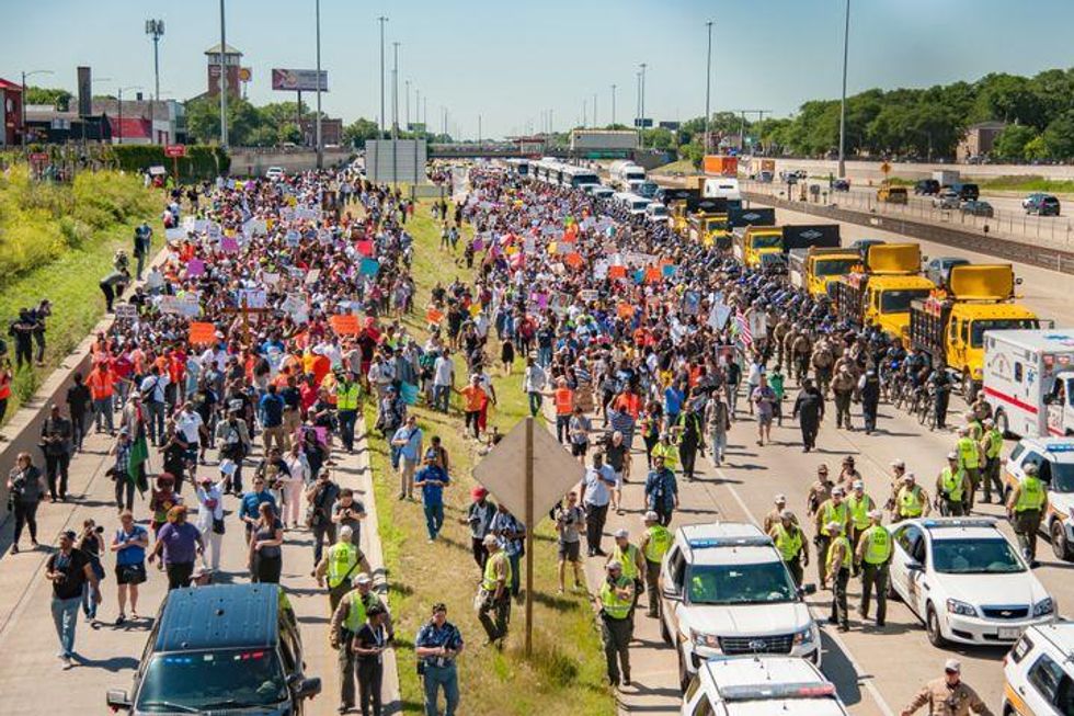 Thousands of activists shut down the Dan Ryan Expressway led by Rev. Michael Pfleger from St. Sabina Catholic Church in Chica