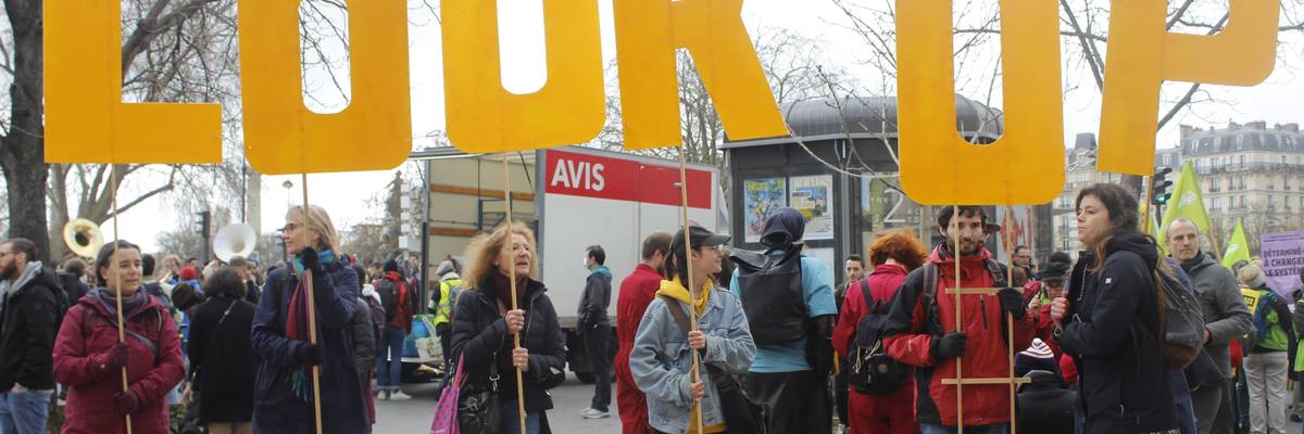 Thousands of people gathered in Paris, France on March 12, 2022 to draw attention to the climate crisis and social injustice amid the presidential election campaign. (Photo: Esra Taskin/Anadolu Agency via Getty Images)