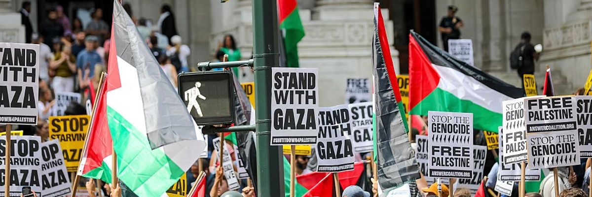 Thousands of pro-Palestine protestors rally and march...
