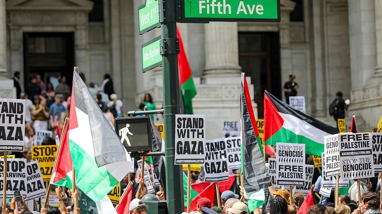 Thousands of pro-Palestine protestors rally and march...